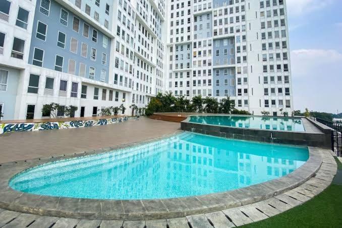 Patraland Urbano By Public Apartemen *